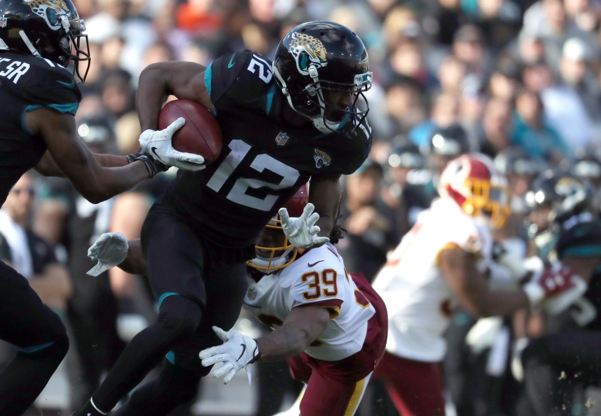 Jacksonville Jaguars receiver Dede Westbrook (12) runs with the ball against the Washington Redskins. Mandatory Credit: Kim Klement-USA TODAY 